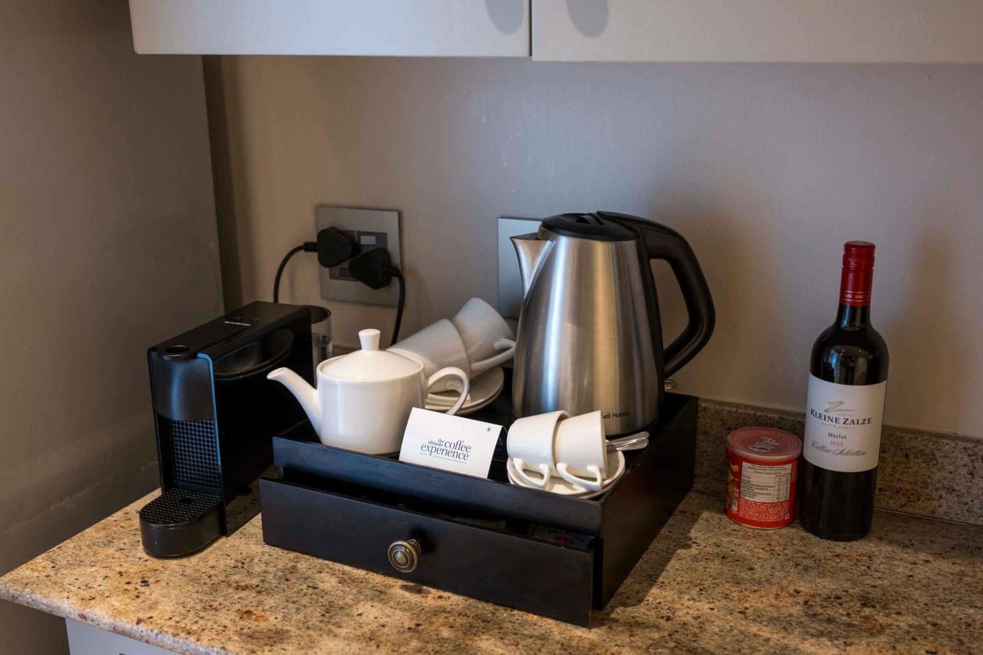 Beverly Hills Дурбан Экстерьер фото A Nespresso machine in a hotel room